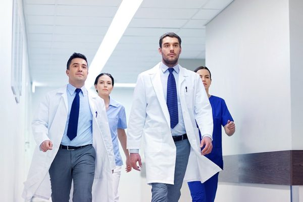 group-of-medics-walking-along-hospital-P92EJ7V-1.jpg